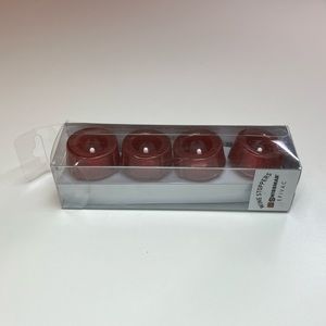 Swissmar wine stoppers. 4 pack. Never used and in unopened pack. Color: Burgundy